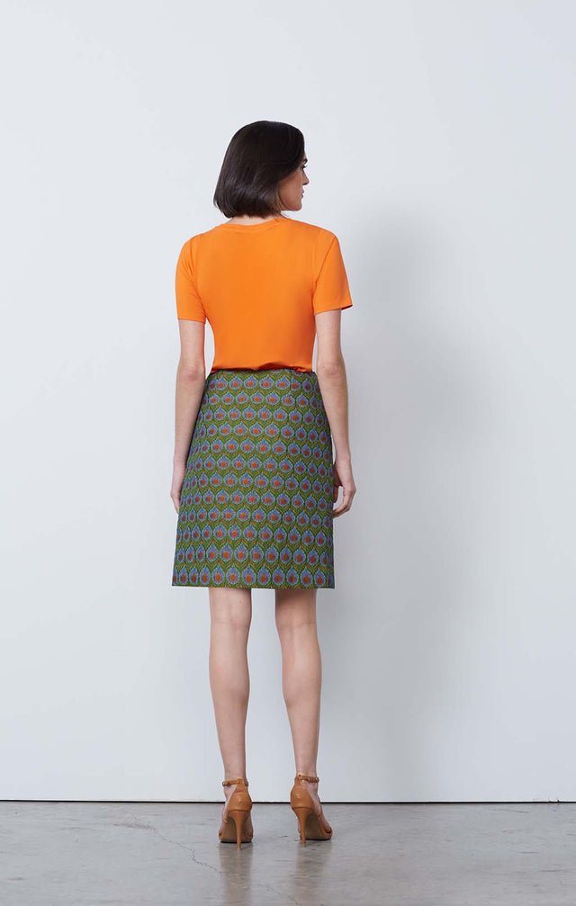 Image of model wearing the Chatsworth skirt with Tuscany Orange Top