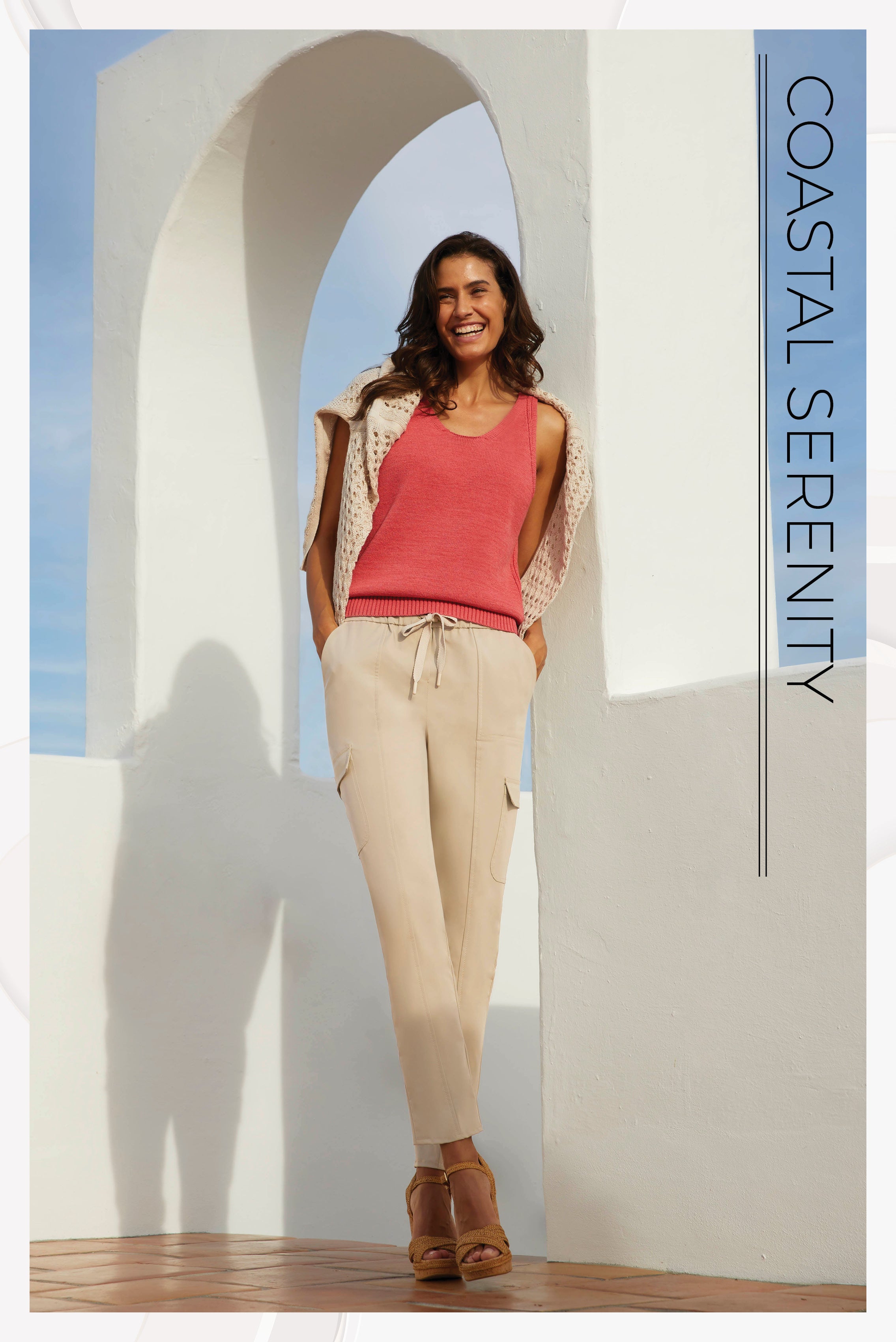 Photo of a model wearing the Capitola pants, a stretch utility travel pants.