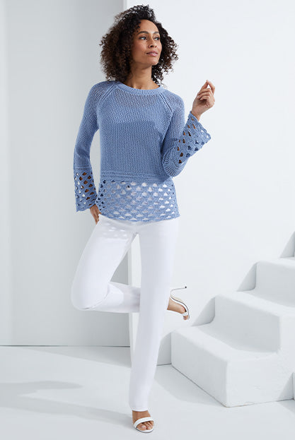 Lookbook photo of a model wearing the Riviera sweater.
