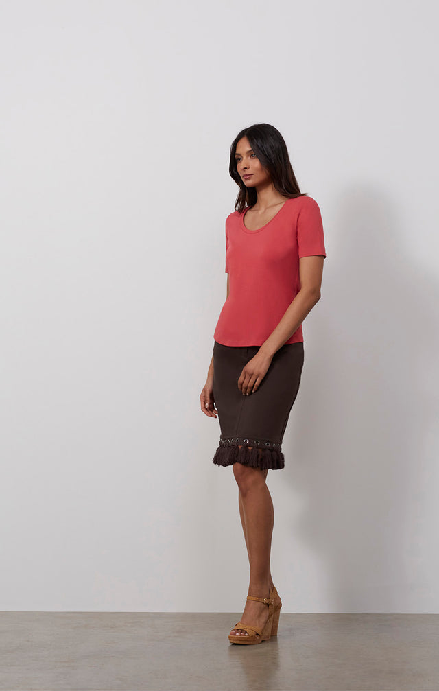 Ecomm photo of a model wearing the Tuscany-Red shirt, which is a stretch cotton jersey scoop-neck tee.
