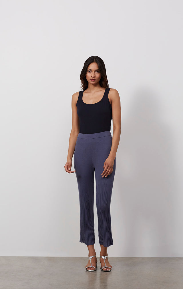 Ecomm photo of a model wearing the Gulf Stream pants, which is a pull-on knit lounge pants.