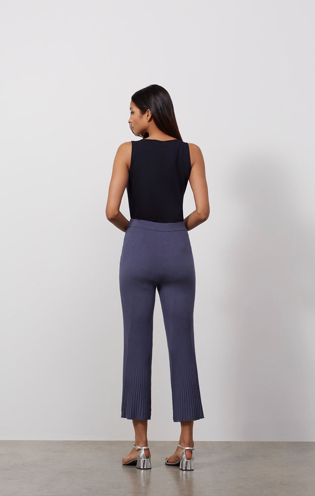 Ecomm photo of a model wearing the Gulf Stream pants, which is a pull-on knit lounge pants.
