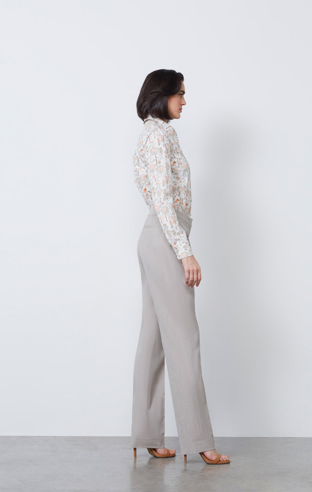 Ecom photo of model wearing the Brandy Hall pants and Topiary shirt.